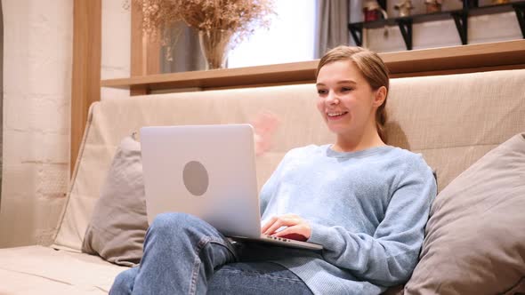 Video Chat By Young Woman at Home