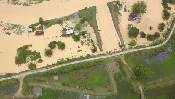 Aerial top down view flood happen at Malays village