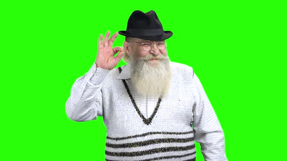 Elderly Man with Beard Showing OK Sign