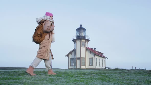 Traveler Enjoying Road Trip By USA Slow Motion Woman Tourist at Lighthouse