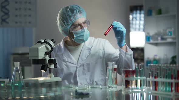 Laboratory Worker Studying Blood Samples to Detect Pathologies, Medical Research
