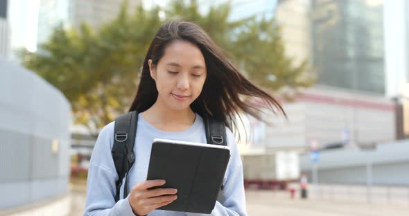 Woman use of mobile phone at outdoor