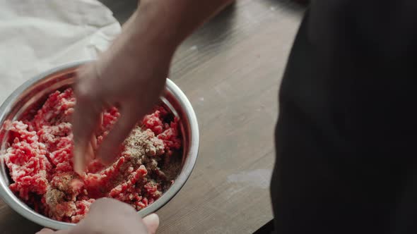 Mixing Ground Meat with Spices