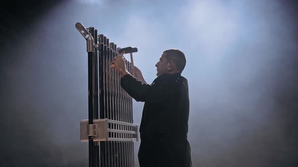 Musician Play the Chime Bells