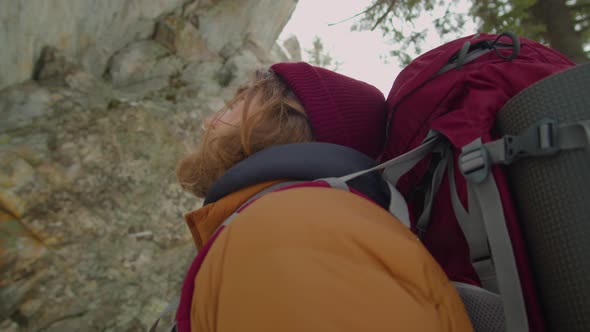 Hiker Looking Up on Mountains