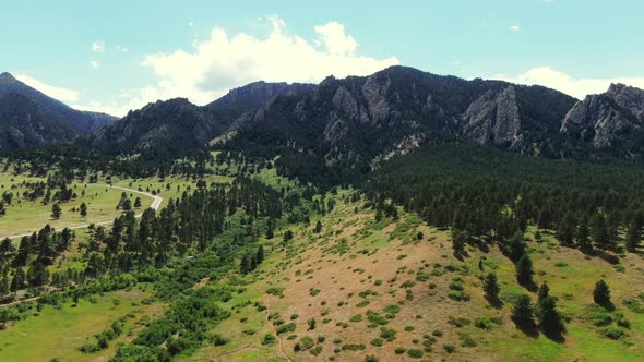 Low Altitude Aerial Dolly Shot of Mountainside in Colorado Springs, Wide Angle
