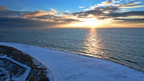 Baltic Sea and Hel peninsula in winter at sunrise.