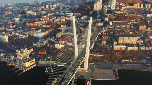 Beautiful Autumn Top View of Cablestayed Bridge with Hills at Sunrise