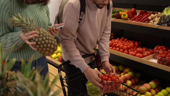 Young Couple Buying Products in Grocery Store