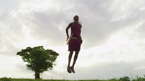 Man performing the Maasai jumping dance