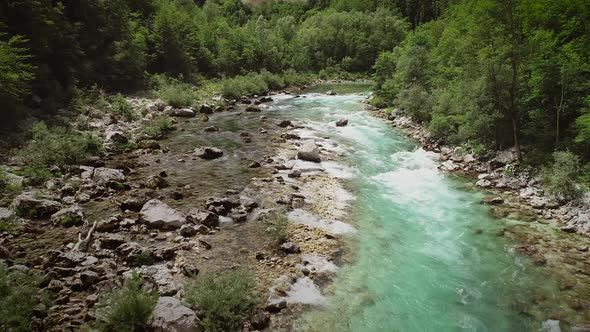 Aerial view of the rocks in water at the Soca river in Slovenia, Europe.