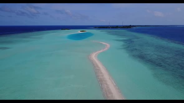 Aerial drone landscape of paradise island beach voyage by blue sea and white sandy background of jou