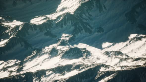 Aerial View of the Alps Mountains in Snow