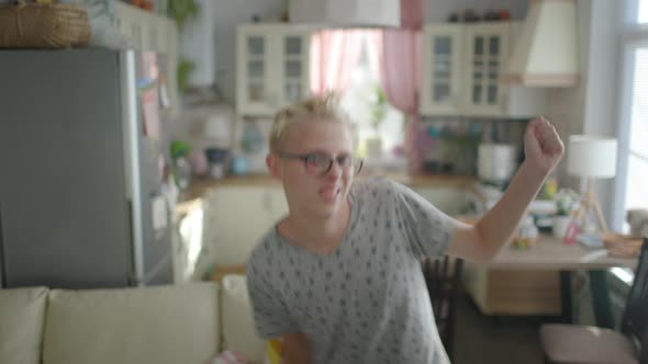 Cute Funny Young Gay Man Wearing Glasses And Bright Clothes