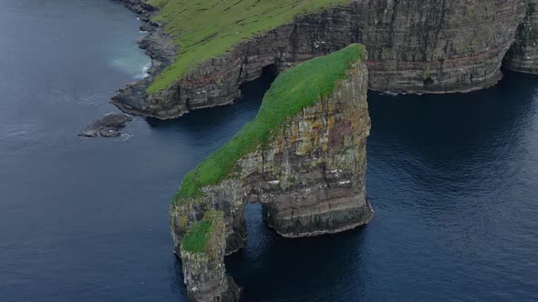 Drone Towards Drangarnir Sea Stacks In Faroe Islands