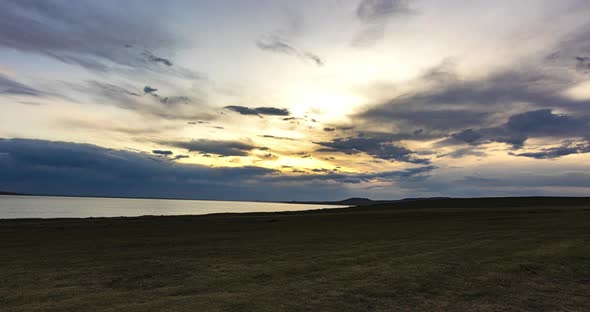 Sunset time lapse over a human made lake at Mongolia