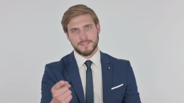 Angry Young Businessman Arguing on White Background