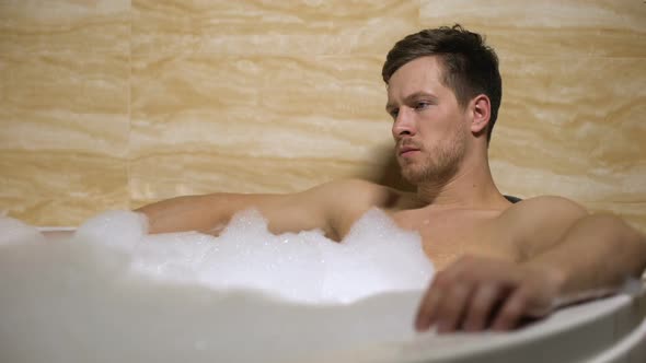 Tensed Man Taking Bath, Thinking About Work and Cant Relax, Difficult Decision