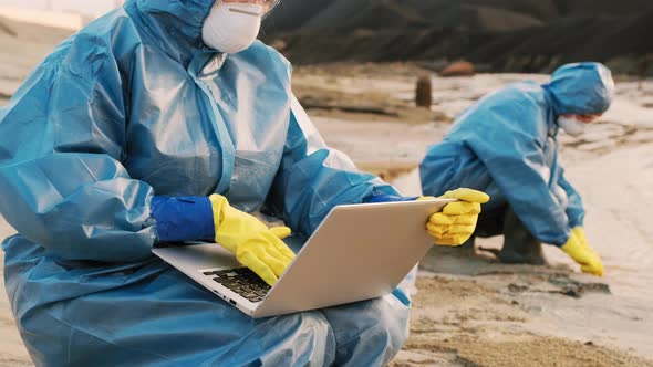 Female Ecologist Working On Laptop