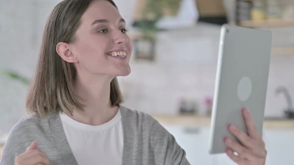 Portrait of Young Woman Doing Video Chat on Tablet