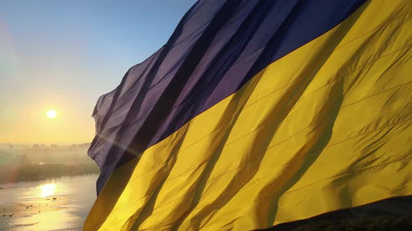 Ukrainian Flag in the Morning at Dawn. Aerial. Kyiv. Ukraine