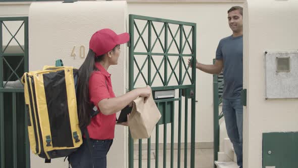 Food Courier Ringing Doorbell