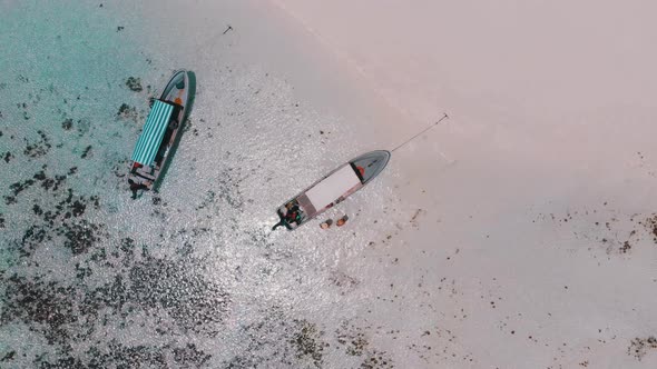 Anchored Pleasure Boats at Sandbanks in Ocean Tropical Island Zanzibar Aerial