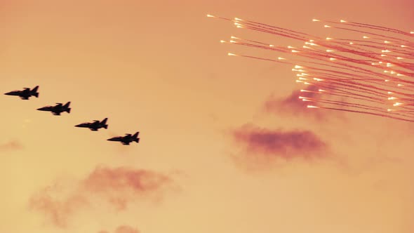 Armed Russian Fighter Jets on the Red Sunset Background