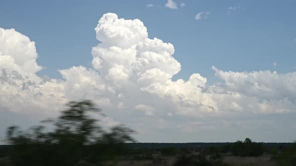 View from car looking out the window at clouds in slow motion