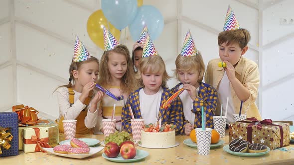 Caucasian Kids Celebrating Birthday at Home