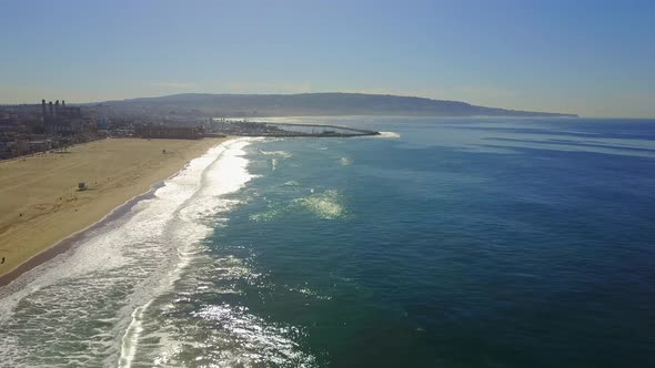 Aerial drone uav view of a marina and the beach and ocean