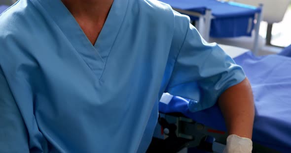 Female nurse in surgical mask at operation theater