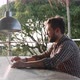 Handsome bearded man opening laptop and starting work outdoor - VideoHive Item for Sale