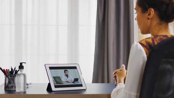 Female Patient in a Video Call with Her Doctor