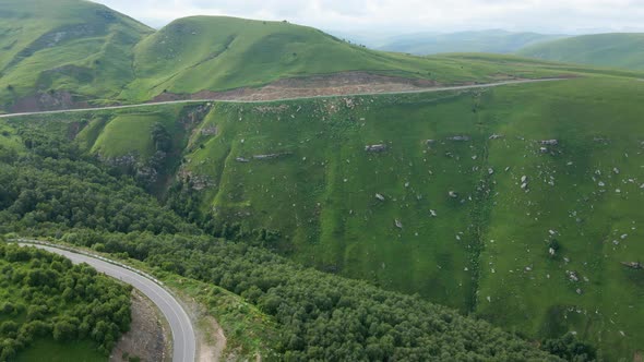 View of the Green Caucasus Mountains in Summer From the Sky