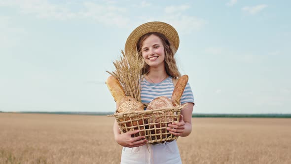 Beautiful Country Lady with Box of a Fresh Bread