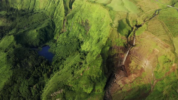 Waterfall and Lake in Poco Ribeira Do Ferreiro Valley Alagoinha Flores Island