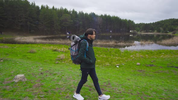 Man with backpack, trekking.