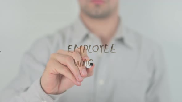 Employee Wages Writing on Screen with Hand