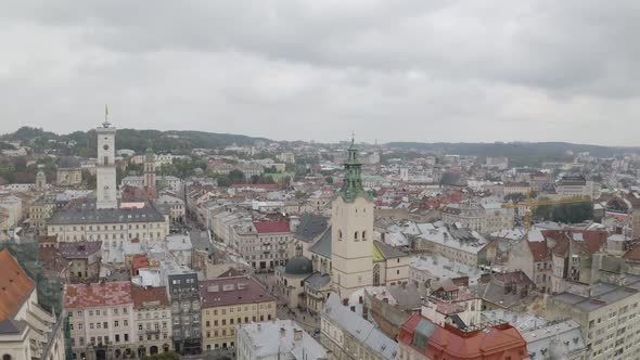 Aerial Drone Video of European City Lviv Ukraine Rynok Square Central Town Hall Dominican Church