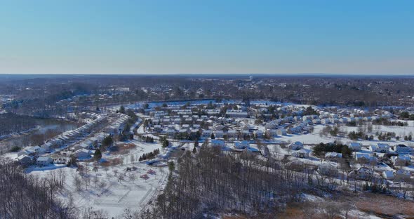 Aerial Top View of Snow Covered House Parked Cars Trees in Frosty Winter Weather Time