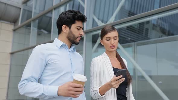 Business People Going To Work With Phone And Coffee On Street