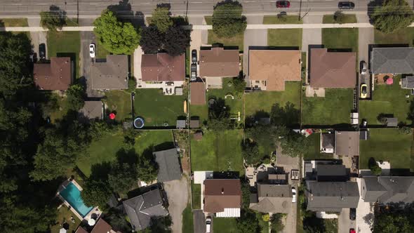 Aerial top down showing Neighborhood beside highway and cemetery in Welland,Canada