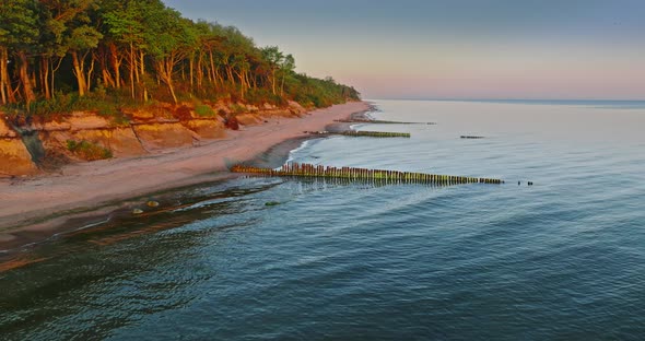 Beach at sunrise on Baltic sea in Poland.