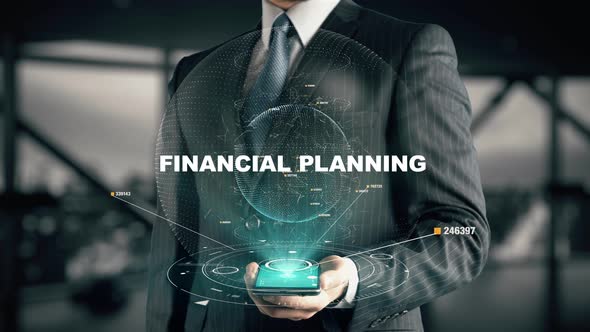 Businessman with Financial Planning Hologram Concept