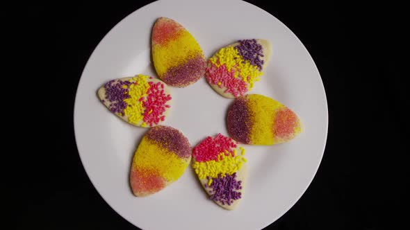 Cinematic, Rotating Shot of Easter Cookies on a Plate 