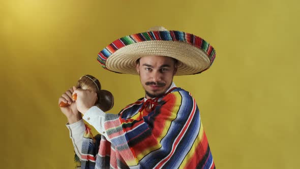 Young Mexican With Moustache Isolated On Yellow