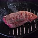 beef steak steaming cooking in a pan on an induction plate - VideoHive Item for Sale