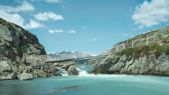 Long exposure time lapse of scenic mountain river, daylight