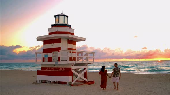 Miami South Beach Sunrise with Lifeguard Tower and Coastline with Colorful Cloud and Blue Sky South